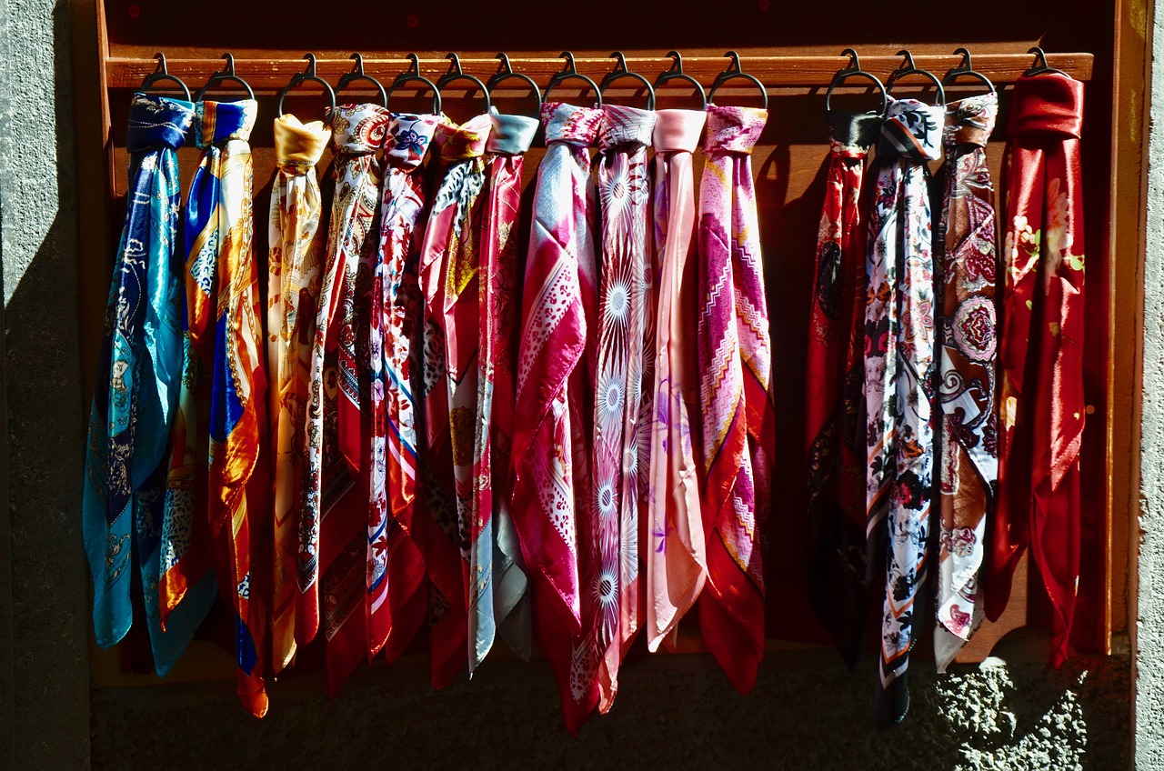 neatly hung silk scarves