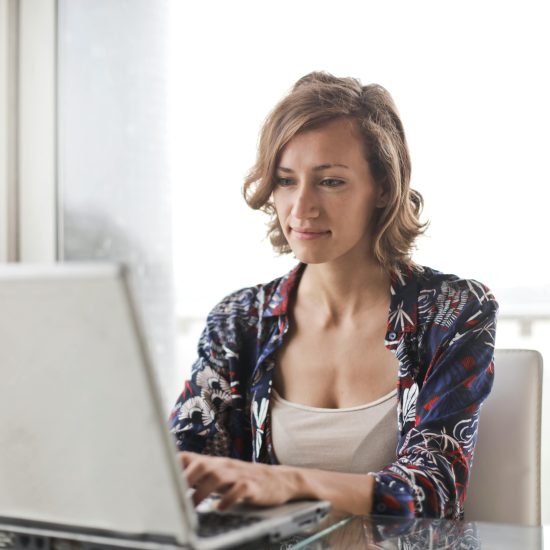 Woman Working on a Laptop
