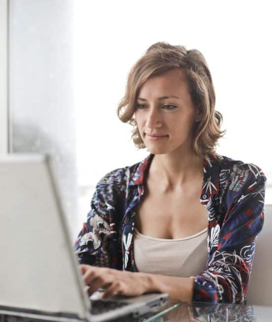 Woman Working on a Laptop